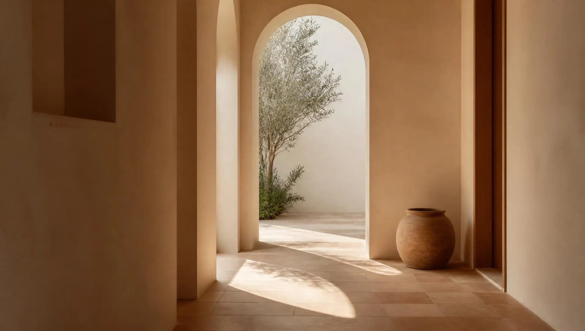 Light falling through an arched hallway, complex trauma therapy in Virginia